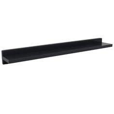 a black shelf that is on the wall