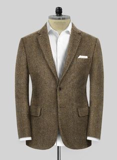 An elegant design incorporating a herringbone pattern for long-lasting style, our Harris Tweed Hebridean Brown Herringbone jacket will surely become a go-to in your smart closet. Crafted from pure wool, a great modern classic Harris Tweed jacket offers wearability and versatility to someone who is not afraid of texture. Pair it with a matching waistcoat and trousers, a crisp white shirt, and brown derby shoes. 
 
 Look Includes  Harris Tweed Hebridean Brown Herringbone Fabric  Two Button Jacket Harris Tweed Suit, Brown Tweed Suit, Grey Tweed Suit, Smart Closet, Herringbone Tweed Jacket, White Linen Suit, Green Velvet Jacket, Peaky Blinders Suit, Tweed Sport Coat