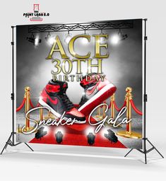 an advertisement for a birthday party with high top sneakers on the red carpet and gold barriers