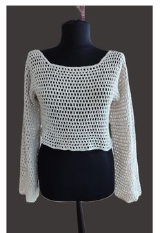 Elegant and handmade eco-friendly 100% cotton crochet long sleeve cream mesh top knitted by hand from scratch. This gorgeous crop top will definitely create an effortless elegance for festivals, the beach and everyday wear. Thanks to its bohemian style and sustainable materials, this summer outfit is sure to last. It will make a delightful gift for your best friend, sister, girlfriend and all your loved ones. I definitely recommend it as a birthday, anniversary or Mother's Day gift! DETAILS Size Bohemian Beach Crop Top For Fall, Bohemian Crop Top For Beach And Fall Season, Bohemian Crop Top For Beach In Fall, Hand Knitted Long Sleeve Crochet Top For Spring, White Crop Top For Beach In Fall Season, Long Sleeve Crochet Lace Top For Beach, White Crop Top For Beach In Fall, Bohemian Hand Knitted Long Sleeve Tops, Handmade Long Sleeve Crochet Top For Summer