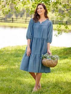 We took one of our most popular muumuu styles and made it out of our exceptionally soft cotton denim for a casual dress you can wear anywhere. It has a roomy, tiered style, relaxed fit, and flattering silhouette. Details include a soft round neckline with a flattering V-notch, 3/4 sleeves with elasticized cuffs, and side-seam pockets. This item runs large; please order one size down to ensure the best fit. Flowing tiers of soft denim Round neckline with V-notch 3/4 sleeves with elasticized cuffs Vermont Country Store, Muumuu Dress, Socks For Women, Country Store, Athletic Socks, Cotton Socks, Easy Wear, Vermont, Day Dresses