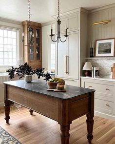 a large kitchen island in the middle of a room