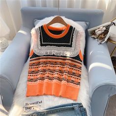 Style: commuting Size: one size Color: blue, orange Winter Orange Sleeveless Vest, Orange Sleeveless Winter Vest, Trendy Knitted Tank Top For Fall, Casual Orange Sleeveless Sweater Vest, Trendy Knitted Vest For Fall, Orange Sleeveless Top For Winter, Sweater Vest Women, Knit Vest, Sweater Vest