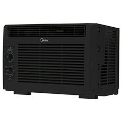 a black air conditioner sitting on top of a white wall