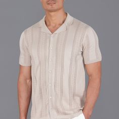 Textured Open Knit Summer Shirt Introducing Santiago, a stylish short sleeve button-through cotton shirt with a Cuban collar neckline and eye-catching all-over textured knit. With its relaxed fit, this easy-to-wear shirt is flattering and comfortable. Made from cool and breathable cotton, this polo shirt is perfect for the warmer months or to refresh your holiday wardrobe.  Perfect to style with ankle-length trousers and leather trainers for a more casual look. Style summary  100% cotton Knitted Casual Polo Collar Top With Pointelle Knit, Casual Tops With Pointelle Knit And Polo Collar, Casual Pointelle Knit Top With Polo Collar, Classic Beige Pointelle Knit Tops, Spring Pointelle Knit Top With Polo Collar, Relaxed Fit Knit Collared Shirt, Collared Cotton Top With Pointelle Knit, Fitted Collared Pointelle Knit Tops, Casual Collared Pointelle Knit Tops