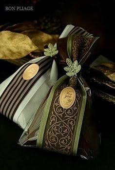 the bag is wrapped in brown and green ribbon