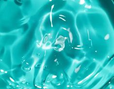 a close up view of water with bubbles