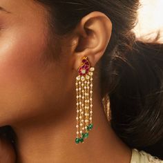 Description : Introducing our regal gold-plated silver Earring, adorned with an enchanting peacock motif crafted in the intricate Jadau technique. The ethereal design is complemented by delicate pearl strands gracefully hanging underneath, adding a touch of timeless elegance. Embrace the essence of royalty and tradition as you don these earrings, perfectly designed to elevate your ethnic look with grace and sophistication. Product Information : Metal: 925 Silver with 1.0 microns Gold Plating Len Ethnic Jewelry Indian, Aesthetic Lookbook, Ethereal Design, Peacock Motif, Gold Jewellry, Jewelry Illustration, Desi Aesthetic, Gold Ring Designs, Festive Wear