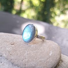 Stunning blue Labradorite crystal in 925 Sterling Silver. Size R. Handcrafted with love on board narrowboat Artemis. Spiritual Labradorite Round Ring, Adjustable Labradorite Open Ring, Spiritual Labradorite Rings, Bohemian Blue Labradorite Rings, Witch Ring, Adjustable Cabochon Labradorite Ring, Witch Rings, Pagan Jewelry, Labradorite Crystal