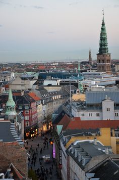 the city is crowded with people and buildings