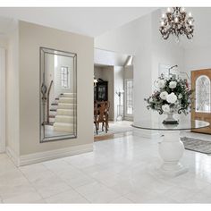 the foyer is clean and ready for guests to use it as a formal dining room