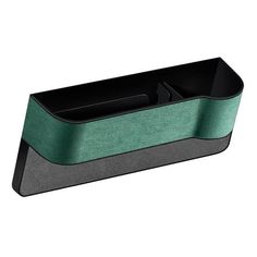 a black and green pen holder with two pens in it on a white background,