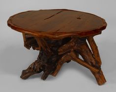 a wooden table made out of logs