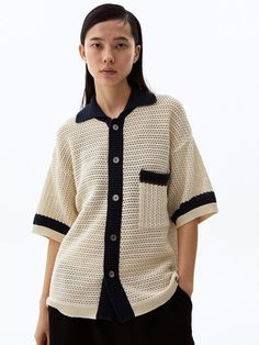 This is a casual and comfortable cardigan that is made out of high quality cotton 100% fabric. With design detail of loose silhouette, point color detail on the collar, cuff, and pocket, it gives a trendy and casual mood.- Loose silhouette- Cool crochet knit texture- Color detail on the collar, cuff, and pocket Casual Cotton Cardigan With Ribbed Collar, Collared Cotton Sweater With Button Closure, Oversized Collared Casual Cardigan, Oversized Collared Cardigan In Casual Style, Oversized Collared Cardigan Casual Style, Casual Oversized Collared Cardigan, Button-up Beige Cotton Cardigan, Cream Cotton Cardigan For Work, Beige Textured Knit Cotton Cardigan