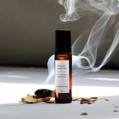 "Recently Featured in Vogue Paris. --- --- The Original Natural Palo Santo Fragrance, made since 2014. --- 100% Natural, Unisex Fragrance Woody, smokey and a little sweet, just like the dense South American forests. This fragrance is : Unisex, earthy, & mysterious. Dominant notes of wild-crafted Sweet Palo Santo, edged with a whisper of Spice. This 100% Natural perfume was designed to recreate the alluring fragrance of sweet, burning Palo Santo wood. Notes of: Palo Santo, Vetiver, Organic Cinnam Botanical Perfume, Perfume Photography, Fragrance Cologne, Cosmetics Photography, Healthy Benefits, Beauty Products Photography, Aroma Oil, Fragrance Set, Natural Perfume