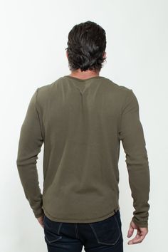 KNITTED HENLEY T-SHIRT IN MILITARY GREEN Khaki Cotton V-neck Top, Khaki Stretch Crew Neck Top, Khaki Crew Neck T-shirt Sporty Style, Green Stretch T-shirt For Fall, Green Stretch Crew Neck T-shirt, Khaki Relaxed Fit Crew Neck Top, Green Stretch Casual T-shirt, Green Relaxed Fit Sporty Top, Green Crew Neck Basic Tops