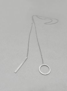 This Lariat necklace is totally handmade made from sterling silver. A dainty necklace that adjusts to any outfit. Great layering charm necklace, easy to wear on its own too. The diameter of the circle is 12 mm and the bar is 20 mm long. Length: 52 cm -----> 20 inches 62 cm -----> 24 inches 72 cm -----> 28 inches Feel free to ask for a different length. The necklace above is not the exact one you will receive. Each one is handmade to order and may slightly vary from the pictures. Please Handmade Minimalist Long Lariat Necklace, Handmade Minimalist Lariat Necklace, Minimalist Handmade Long Lariat Necklace, Sterling Silver Clavicle Chain Lariat Necklace For Everyday, Everyday Sterling Silver Lariat Necklace With Clavicle Chain, Sterling Silver Lariat Necklace For Everyday, Nickel Free Sterling Silver Lariat Necklace, Minimalist Sterling Silver Lariat Necklace With Clavicle Chain, Sterling Silver Minimalist Lariat Necklace