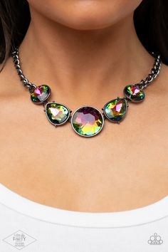 Infused with heavy gunmetal chain, an exaggerated display of round and teardrop-shaped oil spill rhinestones connects below the collar for a blinding look. Features an adjustable clasp closure.

 Sold as one individual necklace. Includes one pair of matching earrings. 


This Fan Favorite is back in the spotlight at the request of our 2021 Life of the Party member with Pink Diamond Access, Kathy D. Multi Necklace, Diamond Life, Oil Spill, Party Necklace, In The Spotlight, Paparazzi Accessories, White Rhinestone, Black Necklace, Paparazzi Jewelry