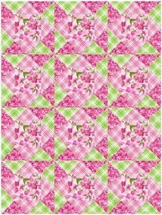 a pink and green checkered pattern with flowers on it's side, in the middle