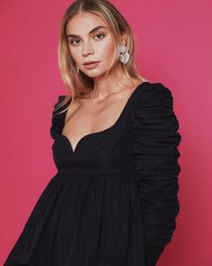 This elegant blouse is a true showstopper. Done with a structured bodice and ruched sleeves to compliment the relaxed body. Back zipper Sweetheart neckline Structured fabric Content: 100% Polyester Halloween Crop Top, Halloween Skirt, Elegant Blouses, Crop Top Blouse, Puff Sleeve Top, Halloween Dress, Cutout Dress, Cardigan Tops, Dress Suits