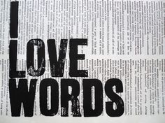 the word i love words written in black and white on top of an open book