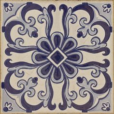 a blue and white tile with an intricate design