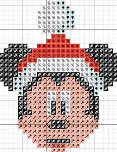 a cross stitch pattern with an image of mario's face in red and white