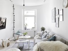 a living room filled with furniture and decor