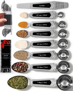 the kitchen utensils have different types of spices and seasonings in each spoon