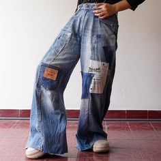 These one-of-a-kind jeans are meticulously handcrafted from upcycled denim sourced from leading brands. Every pair is thoughtfully created by carefully sewing and patching together various fabric pieces, resulting in a unique patchwork design that ensures no two pairs are alike. This craftsmanship reflects a deep attention to detail and a dedication to quality, embodying the skill and passion of the artisans who bring these jeans to life. Inspired by the standout style of the 90s, these jeans of Up Cycle Pants Men, Denim Patchwork Jeans, Reworked Jeans, Patchwork Denim Jeans, Reworked Denim, Patch Jeans, Upcycle Jeans, Patchwork Jeans, Upcycled Denim