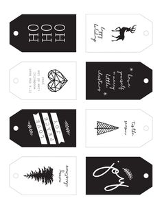 four black and white tags with different designs on them, each one has an arrow