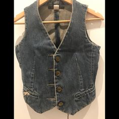 This Fitted Denim Vest From The Late 90s Features Brass Buttons, Distressed Denim Details And A Tie Back. Vintage Marc Jacobs, Coats Vintage, Brass Buttons, Late 90s, Denim Details, Denim Vest, Tie Backs, Tie Back, Distressed Denim