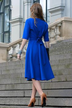 Blue dress with circle skirts. Golden color detail in neckline. Dress with mid sleeves and zipper on the side, tying belt at the back. The material isvery comfortable for wearing them, slightly elastic and crease.When washing, the color remains the same brightness. ➤ Features > dress Retro Blue A-line Midi Dress, Royal Blue A-line Midi Dress, Blue Tie Waist Dress For Work, Blue Midi Dress With Tie Waist For Party, Blue Dress Knee Length, Women Blue Dress, Cocktail Dress Long, Simple Dress Pattern, Circle Skirts