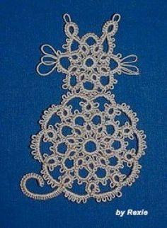 a white doily on a blue background with the words crochet written below it