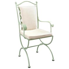 a green chair with a white cushion on it's back and armrests