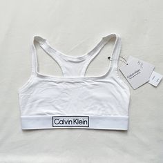 Brand New With Tags! White Medium Support Crop Top For Spring, White Cotton Sports Bra For Spring, Spring Crop Top With Light Support, Summer Loungewear Sports Bra With Adjustable Straps, Cotton Sports Bra With Adjustable Straps For Summer, Summer Sports Bra With Adjustable Straps For Loungewear, Summer Cotton Sports Bra With Adjustable Straps, Spring Stretch Sports Bra, Summer Light Support Sports Bra For Loungewear