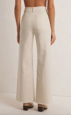 This chic, high waisted pant goes well with any of our tops this season, making it so easy to style, whether you're keeping it casual or going out. Slim fit Stretch Cotton Twill: 58% Cotton, 40% Tencel, 2% Elastane Wide leg pant Hi-waist zipper fly Raw edge hem Back pockets Hand Wash Cold, Hang To Dry Orthotic Shoes, Lounge Bra, Casual Evening, Lounge Dress, Twill Pants, Wide Leg Pant, Slim Fit Pants, Slim Pants, Jogger Jeans