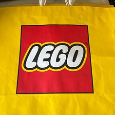 a yellow bag with the lego logo on it