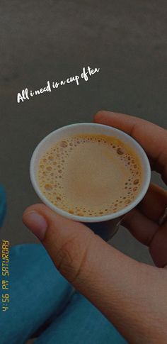 a person holding a cup of coffee with the words all i need is cup tea