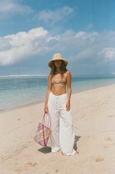 Vibrant colors of raffia handwoven together create a beautiful bucket bag meant for beach, farmers markets or your travels seaside. Beach Bag Outfit, Beach Farmers Market, Neon Bag, Bag Outfit, Farmers Markets, Farmers Market, Cloth Bags, Beach Bag, Bucket Bag