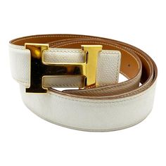 Hermes Constance 32mm Gold H White Grain Brown Reversible Belt 100cm *Marked Hermes *Made in France *K in square (2007) *Comes with the card, ribbon and original box *As seen on too many celebrities -Marked 100cm/ approximately total length is 45″. -Approximately 36.5″ to the first hole , 41.5″ to the last hole. 2 holes were added. -Unisex -In a good condition, except some scuffs on the white side and hairline scratches on the buckle.` 3017-10201  Please see the measurements noted above in the d Hermes Belt, Hermes Accessories, Hermes Constance, Reversible Belt, Classy Jewelry, White Belt, Bits And Bobs, Made In France, Vintage Rings