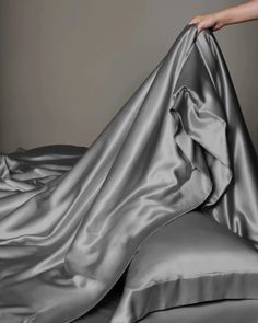 Type: Hidden Zip Closure At The Side Of The Duvet Cover Material: 22 Momme Charmeuse Silk  Features: Satin, wear-resistant and stylish, Glossy, Smooth & Soft. Corner Ties: 8 Corner Ties To Help Keep The Inner Comforter In Place.   Upgrade your bedroom with our 22 Momme silk duvet cover, a luxurious step-up from the 19 Momme line. Crafted from silk fibers in a charmeuse weave, it boasts a polished finish for an exquisite surface shine. With a higher thread count, this duvet cover offers both beau Grey Silk Bedding, Silk Duvet, Silk Bed Sheets, Silk Duvet Cover, Silk Sheets, Silk Bedding, Fitness Inspiration Body, Fashion Figures, Gray Silk