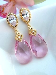 Light Rose Pink Swarovski Pear Drop Crystal with Yellow Gold Plated Peardrop Shape CZ Post Earrings Fine Jewelry Pink Teardrop Pendant, Pink Teardrop Pendant Fine Jewelry, Pink Teardrop Cubic Zirconia Jewelry, Pink Cubic Zirconia Teardrop Jewelry, Pink Cubic Zirconia Dangle Jewelry, Pink Teardrop Crystal Jewelry, Elegant Pink Crystal Bridal Earrings, Fine Jewelry Pink Teardrop Earrings, Pink Pear-shaped Earrings For Anniversary