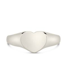 There's nothin' more lovin' than the Cora Heart Signet Ring! You'll give a subtle nod to your one true love every time you slip on this shimmering staple accessory. Wear your heart on your finger with this classic heart-shaped signet ring! Materials: 14K gold plated sterling silver or sterling silver Features: 2mm-5mm band, 0.3" width, 0.3" heart, Lead & Nickel free Trendy Silver Heart Ring For Valentine's Day, Trendy Silver Heart Ring For Anniversary, Classic Oval Heart Ring For Valentine's Day, Classic Heart Ring For Valentine's Day, Classic Heart Ring With Polished Finish, Valentine's Day Hypoallergenic Heart Ring, Silver Heart Shaped Promise Signet Ring, Classic Heart-shaped Rings With Heart Charm, Classic Heart Cut Signet Ring For Valentine's Day