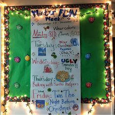 a bulletin board is decorated with christmas lights and holiday decorations on the wall behind it