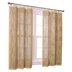 an open window with bamboo curtains on it