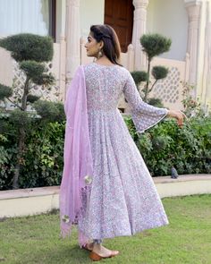 This is a 3-piece set. It comes with soft cotton hand block print anarkali kurta with 32 kali, round neck, 3/4th bell sleeves ankle length.The set also comes with handblock print pants with semi elasticated waistband and kota doria dupatta with gota detailing. Color-Pink & Purple Kurta Fabric-Soft Cotton Bottom Fabric-Cotton Dupatta Fabric-Kota Doria Work-Block Print Neck-Round Neck Sleeves-3/4th Bell Sleeves Washing Care-Dry Clean Only Block Print Anarkali, Printed Anarkali Suits, Anarkali Kurta Set, Mens Wear Wedding, Reception Look, Anarkali Kurta, Purple Hands, Cotton Dupatta, Anarkali Suit