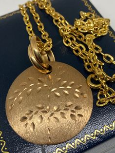 "A Lovely Vintage Gold Over 925 Sterling Silver Brushed Mat Textured Leaf Engraved Pendant/Necklace Marked on Reverse with makers Mark Italy & 925 for sterling silver  20\" Curb Link Chain Size Approx 1.5\" Diameter  Weight 13.82 grams" Stamped 14k Gold Round Necklace, Stamped 14k Gold Round Pendant Necklace, 14k Gold Stamped Round Pendant Necklace, Sterling Silver Pendant Necklace Stamped 14k, Stamped 925 Medallion Necklace For Anniversary, Elegant Stamped Jewelry For Anniversary, Stamped 14k Gold Necklace For Anniversary, Elegant Stamped Jewelry For Anniversaries, Gold Medallion Necklace Stamped 925