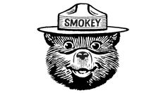 a black and white drawing of a bear wearing a fireman's hat with smokey written on it