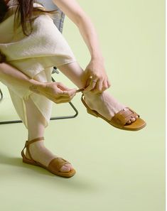 https://www.busstopboutique.com/collections/new-shoe-arrivals/products/tan-leather-sandals Leather T-strap Sandals With Buckle Closure For Vacation, Brown T-strap Sandals With Leather Lining, Casual Beige Leather T-strap Sandals, Tan Leather T-strap Sandals, Beige Leather T-strap Sandals, Everyday Sandals, Tan Flats, Tan Leather Sandals, Cropped White Jeans